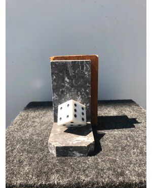 Pair of marble bookends depicting game dice.     