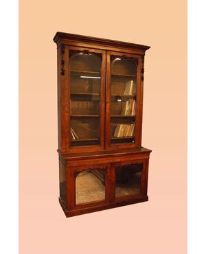 Antica bellissima libreria inglese in radica di noce con intagli e ante con specchio del 1800