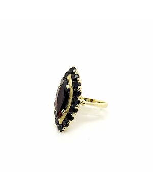Anello in oro giallo con granati