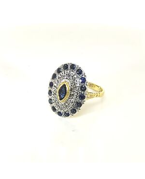 ANELLO ZAFFIRO  TAGLIO MARQUISE SU ORO 18 KT