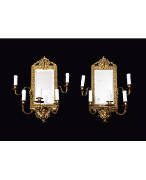 Pair of antique "Ventoline" mirrors, Napoleon III style, in gilded and chiseled bronze. France, 19th century.