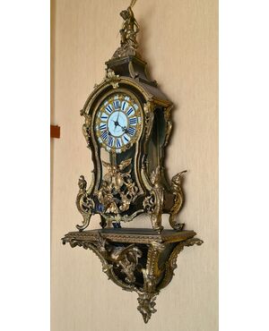 Orologio cartel.   Epoca e stile: Luigi XV, della seconda metà del XVIII secolo