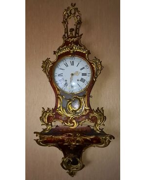 Orologio cartel.   Epoca e stile: Luigi XV, della seconda metà del XVIII secolo. 