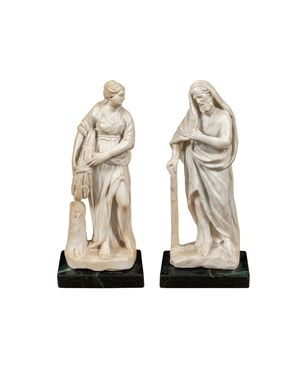 Coppia di sculture in marmo bianco - Allegoria dell’Estate e dell’Inverno. Italia, inizi XVII secolo.