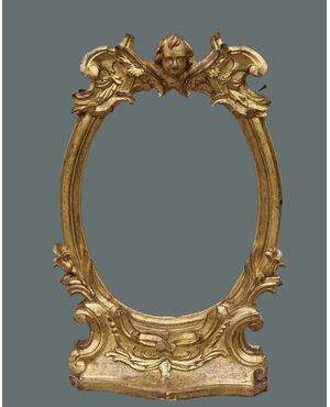 Importante cornice ligure-toscana tardo rinascimentale con angelo alato, fine XVI - inizi XVII secolo