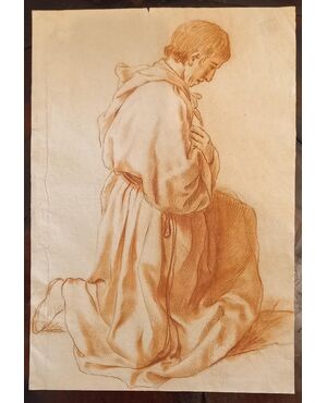 Disegno a sanguigna raffigurante Frate inginocchiato