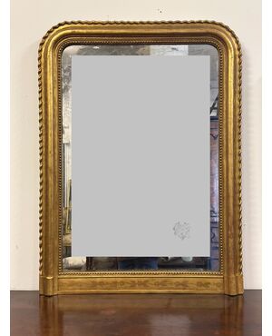Specchiera in legno intagliato dorato con treccia sui lati XIX secolo .  118 x 87 