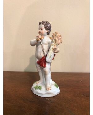 Statuina in porcellana con figura maschile con spighe di grano.Meissen.