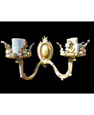 Coppia di lampade applique in bronzo a due fuochi.Marchio Chiarini.