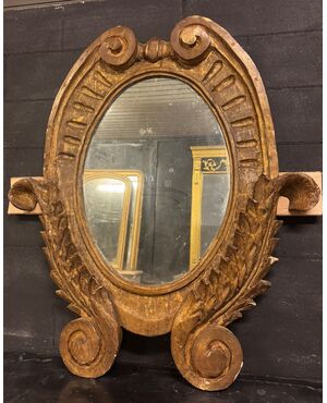 SPECC558 - Oval lacquered and gilded mirror, '7/'800 period, measures cm W 105 x H 207