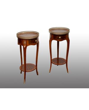 Pair of antique side tables in precious exotic woods with inlays of gilded bronze elements. France, early 20th century.