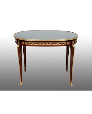 Tavolino antico Napoleone III in mogano con innesti di elementi in bronzo dorato. Francia XIX secolo.