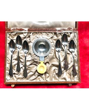 Set of six silver teaspoons with silver and ivory tea strainer. Original box Austria     