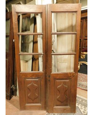 pti643- glass door with two doors in chestnut, 19th century, meas. cm l 106 xh 188     