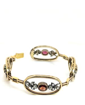 BRACCIALE SEMIRIGIDO IN ORO ARGENTO RUBINI E DIAMANTI