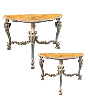 Pair of half-moon consoles