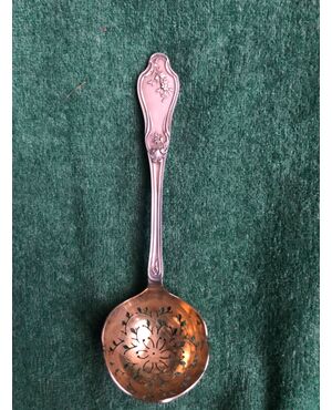 Tea strainer in silver with floral motifs. France.     