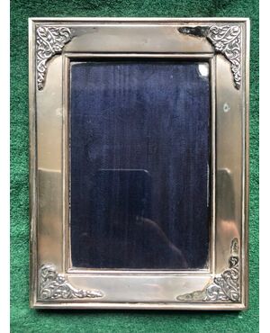Silver picture frame with stylized vegetable decoration details Italy.     