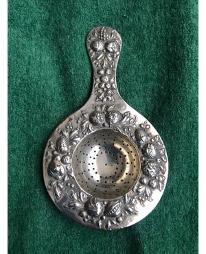 Tea strainer in silver with floral motifs.Germany.     