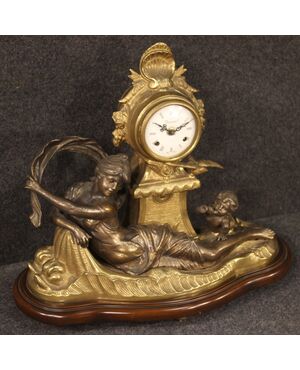 French clock in bronze and gilded antimony