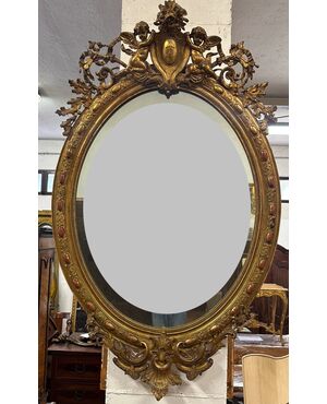 Specchiera lombarda ovale legno intagliato dorato. Primi 800. 155 x 98