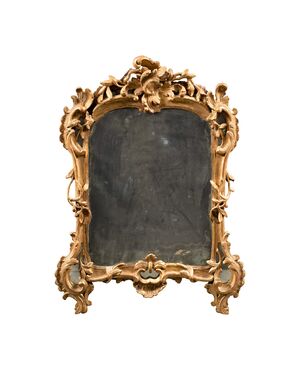 Specchierina in legno intagliato e dorato. Venezia, XVIII secolo.