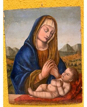 Dipinto su tavola raffigurante Madonna con Bambino . 