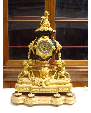 Orologio in bronzo dorato e porcellana 1870 Napoleone III Francia