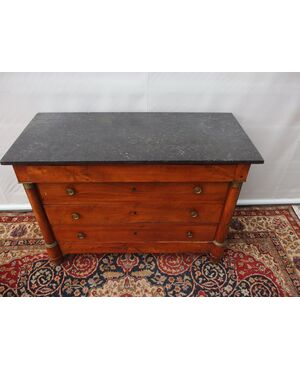 Empire style walnut chest of drawers with black marble, 19th century