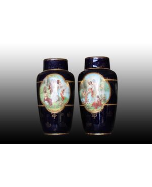 Pair of Austrian Vienna Manufacture porcelain vases with neo-classical scenes.