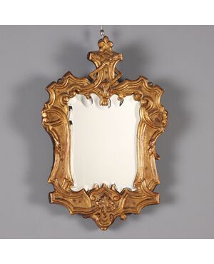 Louis XIV carved and gilded wood mirror, Italy, first quarter of the 18th century