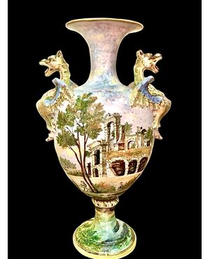 Coppia di vasi in maiolica policroma decorati a paesaggi e personaggi.Angelo Minghetti.Bologna.