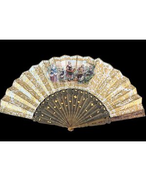 Fan in pierced and gilded tortoiseshell with paper sheet featuring watercolor prints with gallant scenes.
