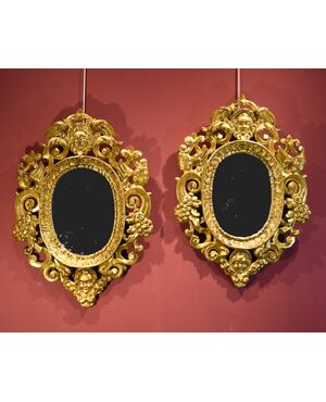 Pair of carved and gilded mirrors 'alla Sansovino', Venice 18th century