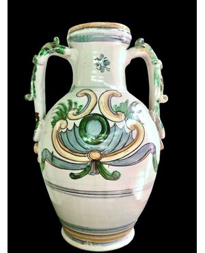 Two-handled majolica vase with rocaille decoration and stylized vegetal motifs. Caltagirone, Sicily.