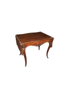 French Louis Philippe style mahogany table with side flaps