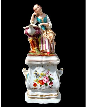 Figurative porcelain veilleuse with lady and floral decoration. France