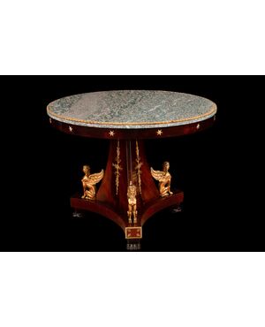 Circular mahogany feather table with marble top