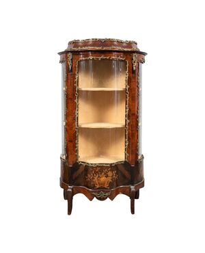 Showcase veneered in various woods. France, late 19th century.