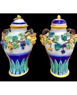 Pair of majolica vases with vine and plant motifs in relief. Imola manufacture.