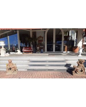 Pair of stone putti