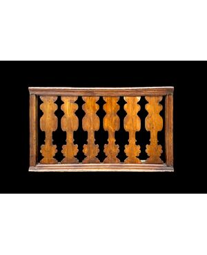 Solid wood balustrade railing.