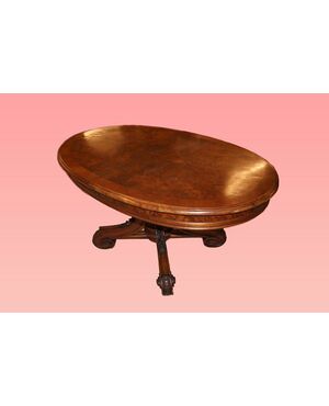 Fixed oval Louis Philippe style living room table from the 1800s in mahogany and elm burl.