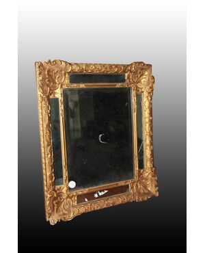 Graceful French mirror from the 1800s, Louis XVI style, gold leaf gilded.