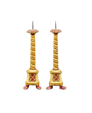 Pair of lacquered and painted wooden candlesticks. Venice, 18th/19th century.