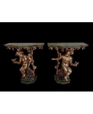 Pair of lacquered and gilded consoles