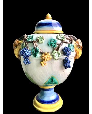 Pair of majolica vases with raised grape vine decoration and leaf motif. Rubbiani manufacture, Sassuolo.