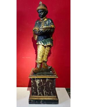 Moor servant sculptures in 18th century Venice