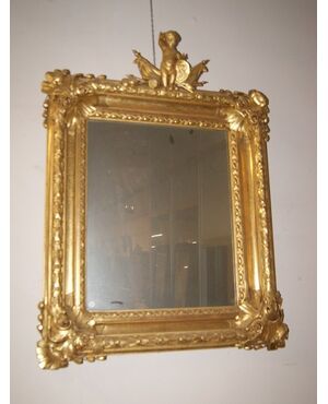 Stupenda specchiera francese dorata con putto di inizio 1800 foglia oro