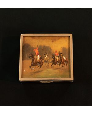 Cigarette box with polo game     